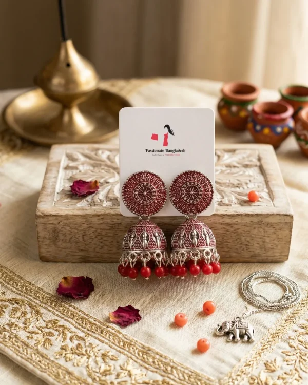 Traditional oxidized-style jhumka earrings with red, yellow and blue stones, perfect for saree, salwar and festive party looks from Passionate Bangladesh. Shop now at www.passionatebangladesh.com