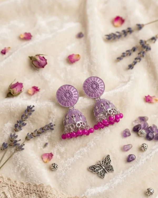 Traditional oxidized-style jhumka earrings with red, yellow and blue stones, perfect for saree, salwar and festive party looks from Passionate Bangladesh. Shop now at www.passionatebangladesh.com