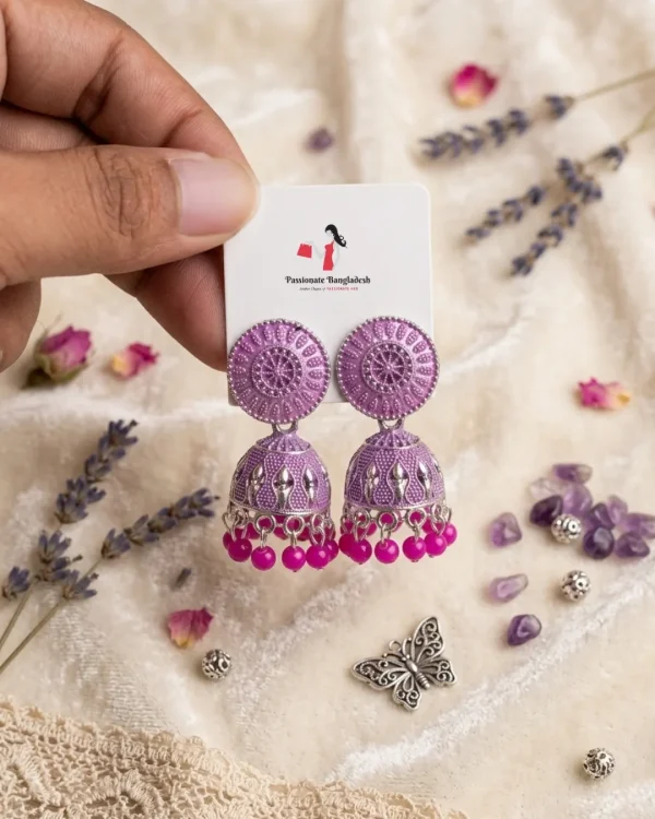 Traditional oxidized-style jhumka earrings with red, yellow and blue stones, perfect for saree, salwar and festive party looks from Passionate Bangladesh. Shop now at www.passionatebangladesh.com