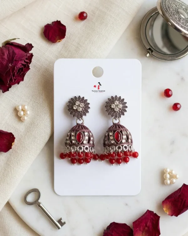 Traditional oxidized-style jhumka earrings with red, yellow and blue stones, perfect for saree, salwar and festive party looks from Passionate Bangladesh. Shop now at www.passionatebangladesh.com