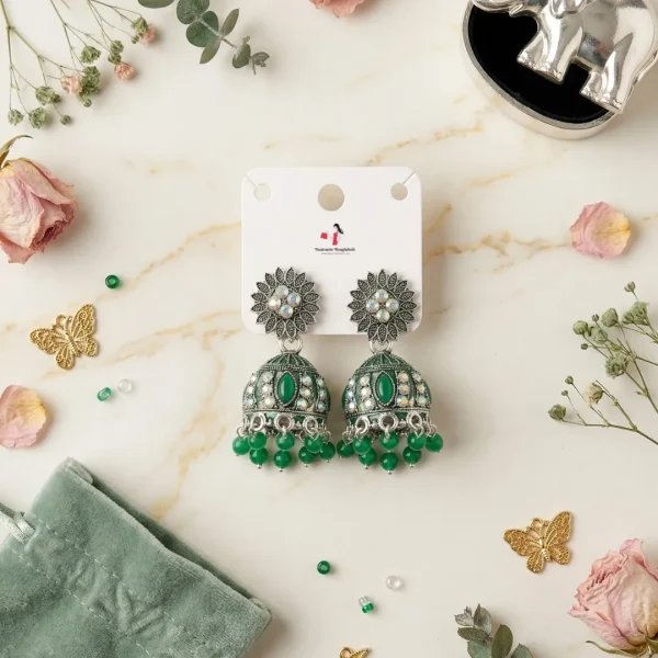 Traditional oxidized-style jhumka earrings with red, yellow and blue stones, perfect for saree, salwar and festive party looks from Passionate Bangladesh. Shop now at www.passionatebangladesh.com