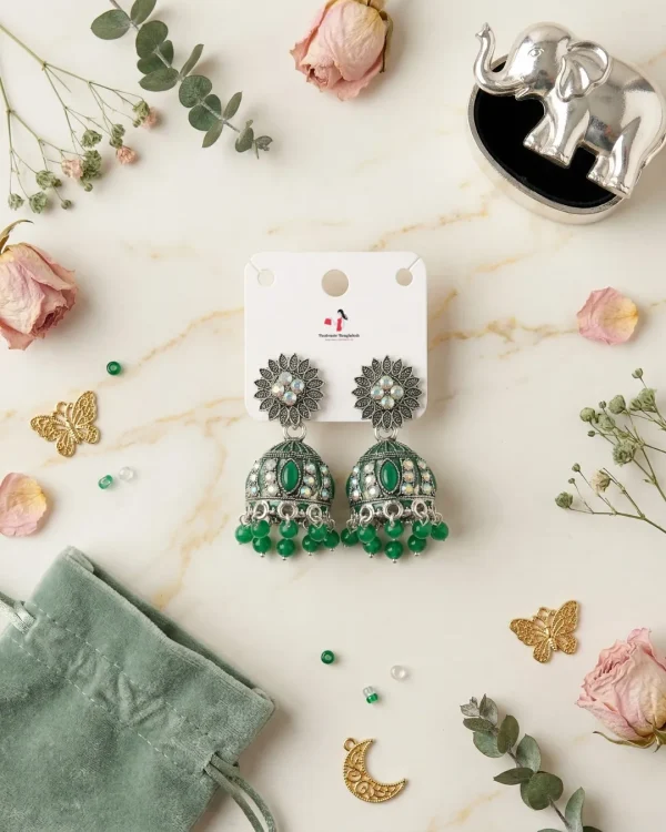 Traditional oxidized-style jhumka earrings with red, yellow and blue stones, perfect for saree, salwar and festive party looks from Passionate Bangladesh. Shop now at www.passionatebangladesh.com