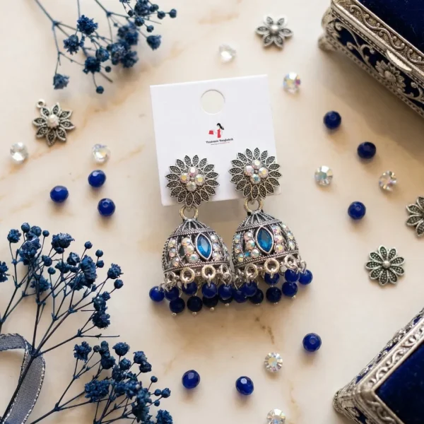 Traditional oxidized-style jhumka earrings with red, yellow and blue stones, perfect for saree, salwar and festive party looks from Passionate Bangladesh. Shop now at www.passionatebangladesh.com