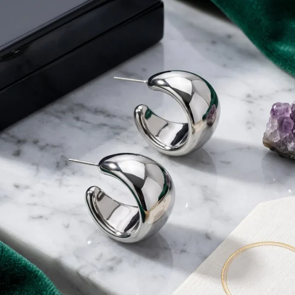 Silver HOOP Earrings for girls and women at PASSIONATE BANGLADESH at a very affordable and cheap price. Beauty with silver dazzling plastic earrings pair. Party on at disco.