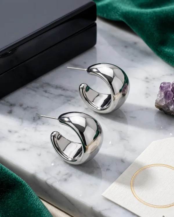 Silver HOOP Earrings for girls and women at PASSIONATE BANGLADESH at a very affordable and cheap price. Beauty with silver dazzling plastic earrings pair. Party on at disco.