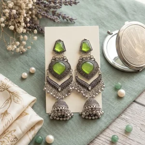 Traditional oxidized-style jhumka earrings with red, yellow and blue stones, perfect for saree, salwar and festive party looks from Passionate Bangladesh. Shop now at https://passionatebangladesh.com/product-category/earring/indian-earring/