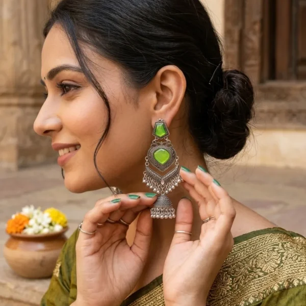Traditional oxidized-style jhumka earrings with red, yellow and blue stones, perfect for saree, salwar and festive party looks from Passionate Bangladesh. Shop now at https://passionatebangladesh.com/product-category/earring/indian-earring/