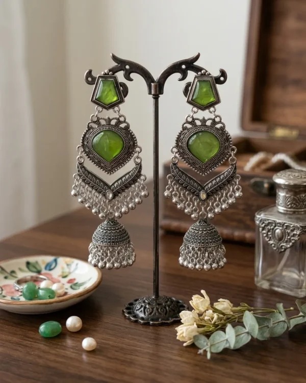 Traditional oxidized-style jhumka earrings with red, yellow and blue stones, perfect for saree, salwar and festive party looks from Passionate Bangladesh. Shop now at https://passionatebangladesh.com/product-category/earring/indian-earring/