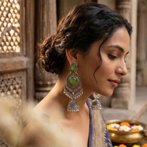 Traditional oxidized-style jhumka earrings with red, yellow and blue stones, perfect for saree, salwar and festive party looks from Passionate Bangladesh. Shop now at https://passionatebangladesh.com/product-category/earring/indian-earring/
