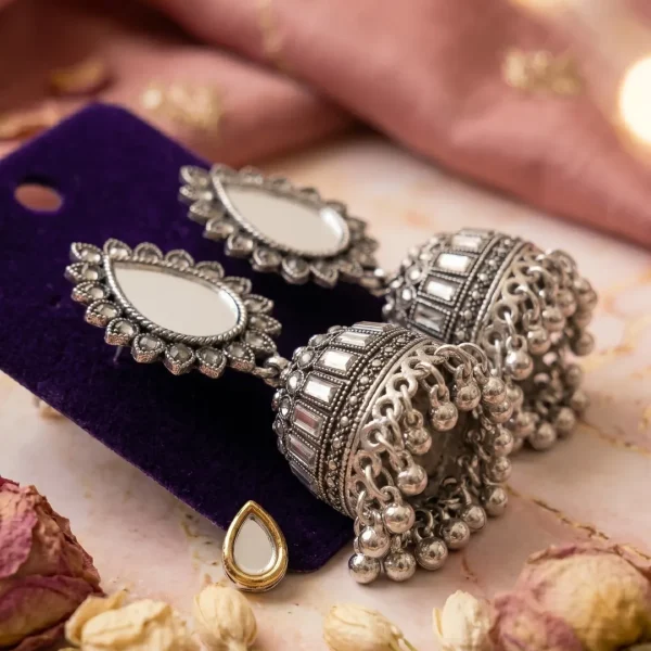 Traditional oxidized-style jhumka earrings with red, yellow and blue stones, perfect for saree, salwar and festive party looks from Passionate Bangladesh. Shop now at https://passionatebangladesh.com/product-category/earring/indian-earring/