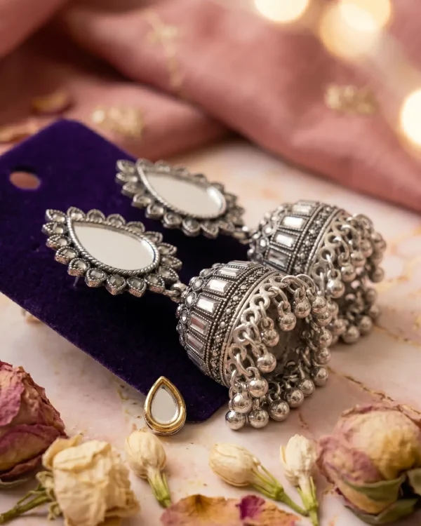 Traditional oxidized-style jhumka earrings with red, yellow and blue stones, perfect for saree, salwar and festive party looks from Passionate Bangladesh. Shop now at https://passionatebangladesh.com/product-category/earring/indian-earring/