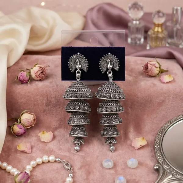 Traditional oxidized-style jhumka earrings with red, yellow and blue stones, perfect for saree, salwar and festive party looks from Passionate Bangladesh. Shop now at https://passionatebangladesh.com/product-category/earring/indian-earring/
