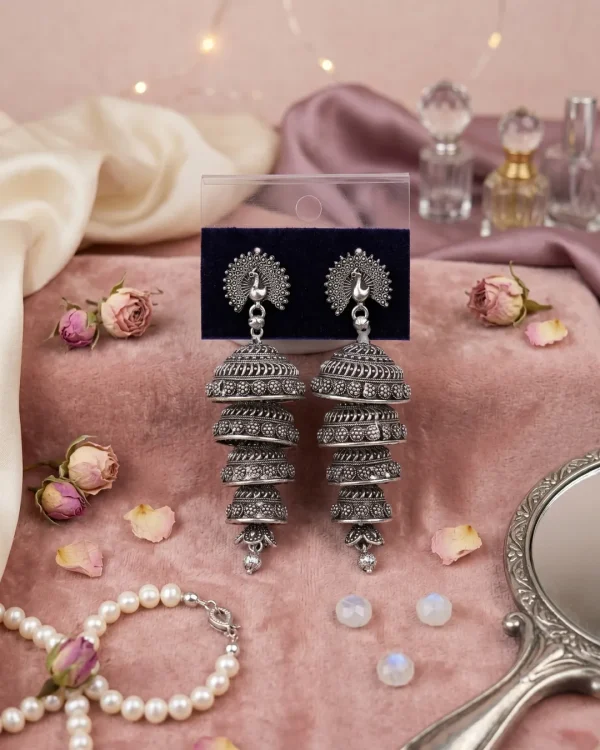Traditional oxidized-style jhumka earrings with red, yellow and blue stones, perfect for saree, salwar and festive party looks from Passionate Bangladesh. Shop now at https://passionatebangladesh.com/product-category/earring/indian-earring/