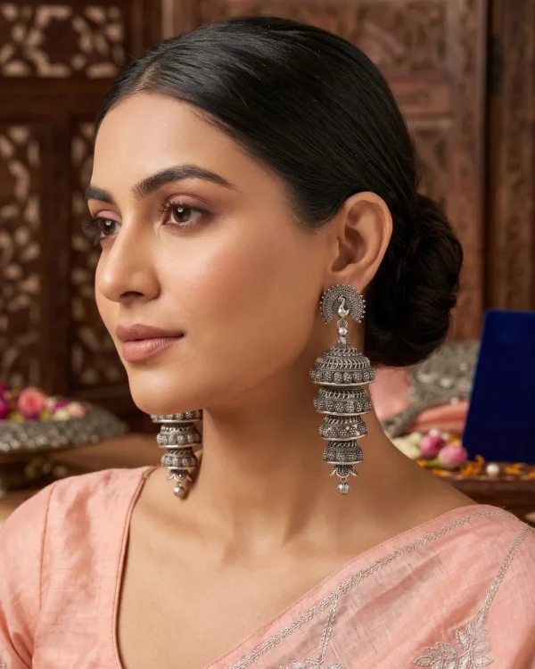 Traditional oxidized-style jhumka earrings with red, yellow and blue stones, perfect for saree, salwar and festive party looks from Passionate Bangladesh. Shop now at https://passionatebangladesh.com/product-category/earring/indian-earring/