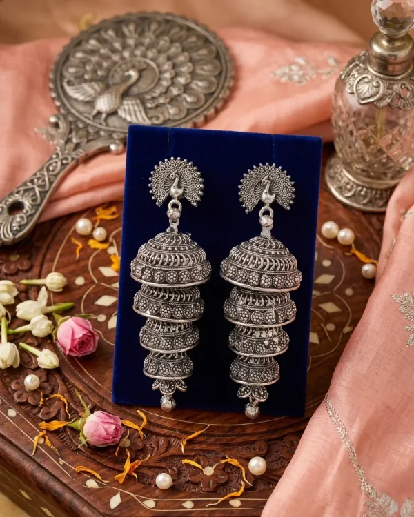 Traditional oxidized-style jhumka earrings with red, yellow and blue stones, perfect for saree, salwar and festive party looks from Passionate Bangladesh. Shop now at https://passionatebangladesh.com/product-category/earring/indian-earring/